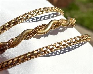 18K Gold Bangle Bracelets. Sold separately.