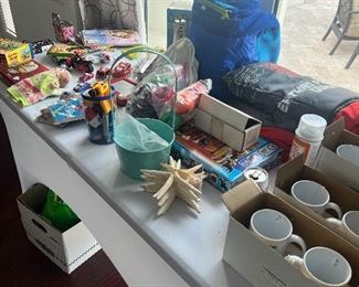 A variety of mugs and children’s toys