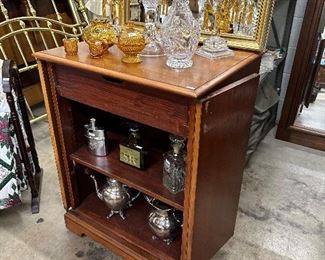  Mid century mahogany rolling bar with drawer
