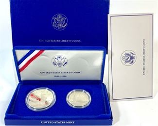 1986-S US Liberty Coin Proof Sets with Silver Dollar and Clad Half Dollar - The commemorative set includes a Liberty Silver Dollar proof struck in 26.73g of .900 Silver and a clad Half Dollar proof both struck at the San Francisco mint. The set commemorates the 100th Anniversary of the State of Liberty