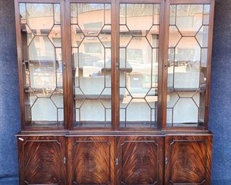 Fantastic Impressive 20th Century Mahogany Chippendale Style Breakfront Hutch Bookcase Display Cabinet Fabric Back Four Astral Glazed Doors and Four Flame Mahogany Panelled Doors 