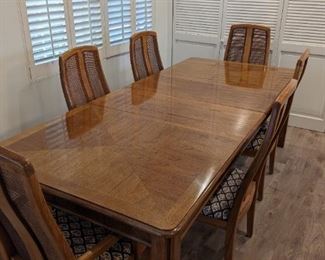 This table has two leaves and can seat up to 10.