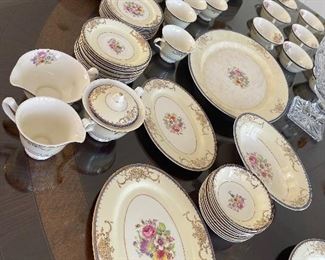 This set is  Vintage  from Tiffany we have  10 plates 10inches, 10 soup plates 5" ,10 small  round 5 " ,9 small plates 6", 12 saucers 6", 12 cups, gravy bowl, Milk and sugar, vegetable platter 16 inches  top and bottom fruit dish 9-1/2 inches
