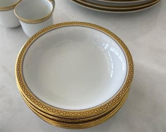 10 plates 6-1/4",  6 plates 9" 5 dishes 5", 4 demi tasse cups, 10 demitasse saucers, Bohemian veg. Platter,9 double handle soup bowls.18 saucers.  10 demitasse plates  .  this set is from Czechoslovakia