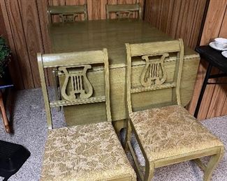 Antique/Vintage Lyre Ducan phyfe dinner table set with four harp/lyre chairs. Table folded down.