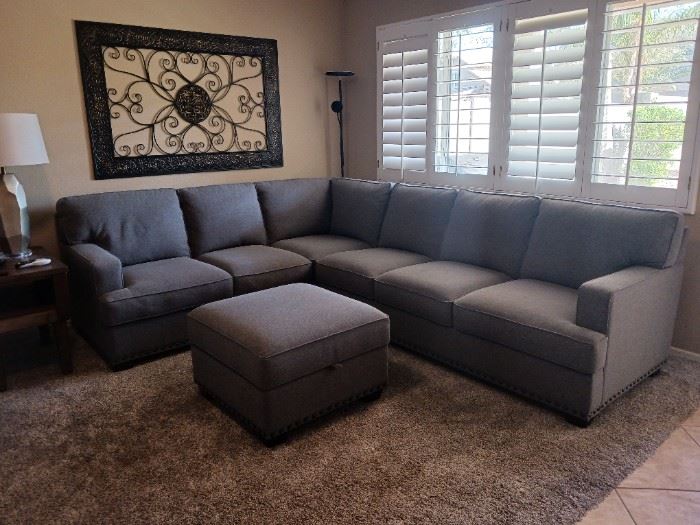 Thomasville sectional with storage ottoman.  Gray fabric.  Like new condition. $900