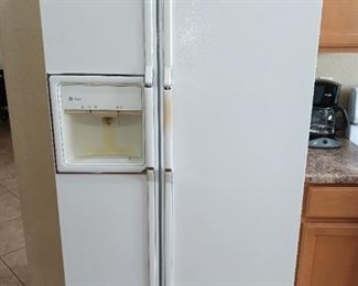 GE Profile Side-by-Side white refrigerator.
