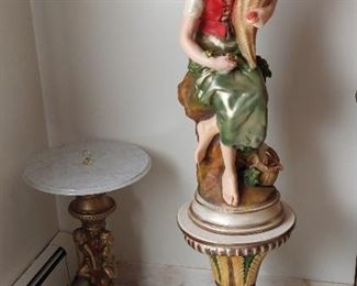 fine Italian hand painted statues in several rooms of   the house