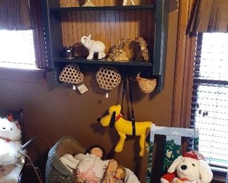 painted wall hanging shelf, Disney Pluto dog. Lee Middleton Firstborn, Patty Cake, Grace S Putman bisque doll, Lang Lang, Shirley Temple 1972, vintage wicker doll carriage, Susie Moppet doll, Effanbee W.C. Fields doll