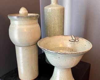 Lot 005-DR: Artisan Pottery Trio

Features: 
•	Tall, lidded canister (signed Margaret Cardwell)
•	Pedestal bowl (unsigned, but assumed by Margaret Cardwell)
•	Tall vase (commercially produced)

Dimensions:  
•	Tall canister with lid: 12”H x 4.5”H
•	Pedestal bowl: 7”H x 7.5”D at top
•	Vase with narrow opening: 13.5”H

Condition: Very Good pre-owned condition
