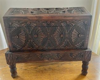 Lot 020-LR: Small Ornately-Carved Storage Chest

Features: Small (table-top) ornately carved storage chest on wood stand.

Dimensions: 21”W x 13”D x 18”H


Condition: Good pre-owned condition.
