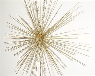 Golden starburst wall art