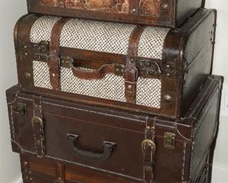 Being sold individually these trunks are leather wrapped, tweed, houndstooth.