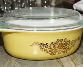 Vintage Pyrex oval gold floral on yellow covered casserole dish