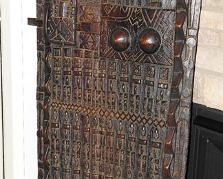 Carved Dogon Door-this stands about 6ft tall x 4ft wide. Traditionally used as granary closures, Dogon Doors feature glyphs that tell many stories, from spiritual appeals to the good life, depictions of the original human tribe and tokens of prosperity.  Cool, huh?