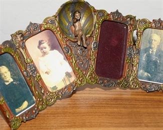 Cast iron multi-panel cherub picture frame