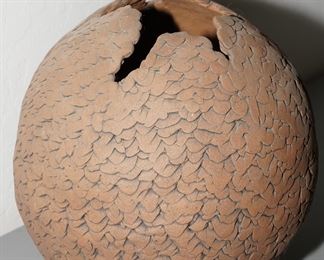 "Down to Earth" clay sculpture by Sue Abbrescia