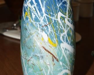 There are several art glass pieces available for purchase; including vases, trivets, coasters, bowls, platters, plates, sculptures and more. 