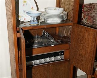 Remember the old vintage rattan/wood Magnavox turn table cabinets?