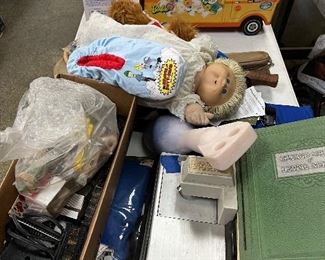cabbage patch doll, vintage barbie camper, and other miscellaneous toys