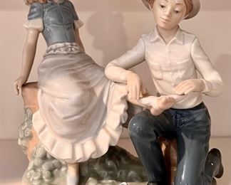 Nao by Lladro "Bandaging the Foot" Figurine