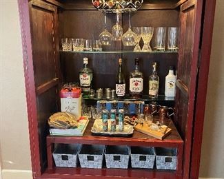 This cabinet is used as a bar but has many uses