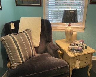 Super comfortable vintage upholstered chair and antiqued vintage side table