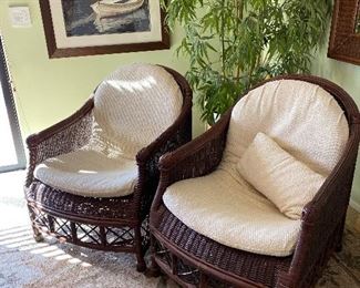 $395. Tommy Bahama rattan lounge chairs (2) with cushions.