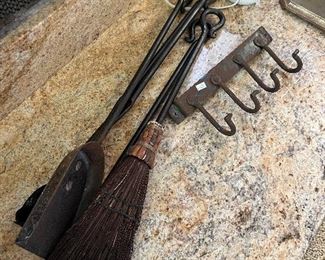 Hand Wrought Iron wall mounted fireplace tools.