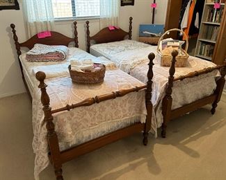 Pair of Maple twin beds and mattress sets