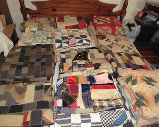 Many antique quilts