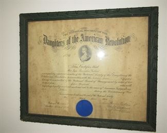 Many antique framed documents