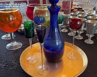 Crystal Decanter with various colored cordial glasses