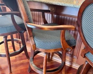 Four swivel upholstered bar stools