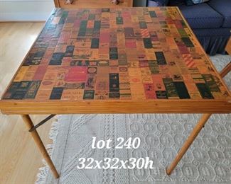 Vintage decoupage card table, match book covers, many from Virginia 