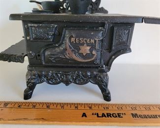 Salesman sample cast iron stove