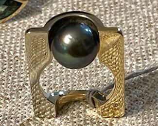 black pearl Peter Barr ring with diamonds and in two tone gold