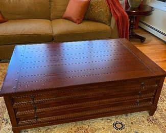 Safavieh American Home Map Coffee Table - Cherry Finish.  53 1/4” wide x 35” Deep x 20” High. Lots of storage includes two drawers, top drawer 2” high great for remotes, DVD’s, lower deep drawer is a 6” high and great for throw blankets, pillows, etc.