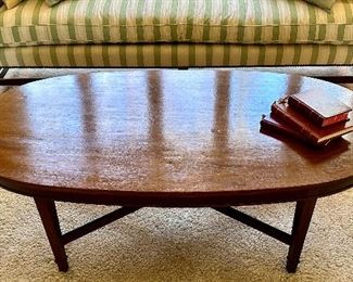 Beautiful Oval Mahogany Coffee Table, No Marks, but was made with care just like everything else in this home! 