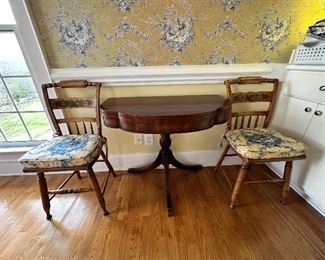 Wonderful Mahogany flip top game table and two Hitchcock style chairs. 