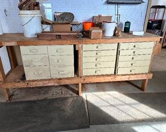 Well built garage workbench with 4 banks of drawers. 