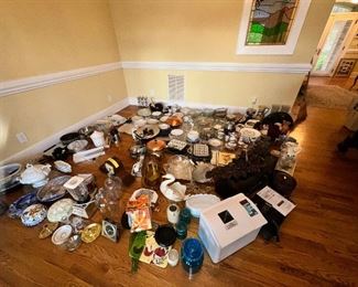 Various small kitchen appliance and kitchenware. 