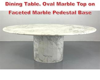 Lot 8 Italian style Marble Pedestal Dining Table. Oval Marble Top on Faceted Marble Pedestal Base