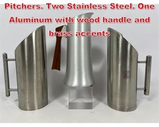 Lot 29 3pc Modernist Serving Pitchers. Two Stainless Steel. One Aluminum with wood handle and brass accents