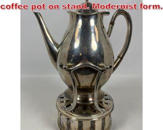 Lot 67 Mexican Sterling silver coffee pot on stand. Modernist form. 