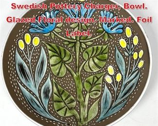 Lot 75 UPSALA EKEBY Large Swedish Pottery Charger, Bowl. Glazed Floral design. Marked. Foil Label. 