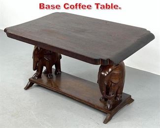 Lot 108 Dark wood Carved Elephant Base Coffee Table. 