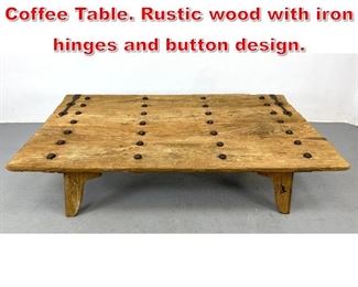 Lot 156 Large Oversized Decorator Coffee Table. Rustic wood with iron hinges and button design. 