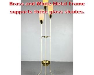 Lot 175 Modernist Floor Lamp. Brass and White Metal Frame supports three glass shades. 