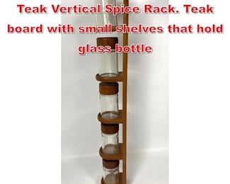 Lot 185 DIGSMED Danish Modern Teak Vertical Spice Rack. Teak board with small shelves that hold glass bottle